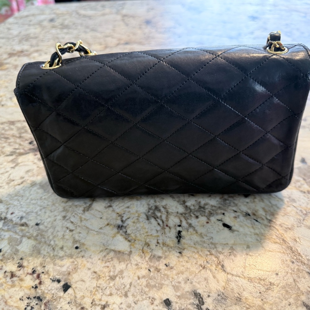 CHANEL Black Quilted Crossbody Bag with Gold Accents - Picture 4 of 8